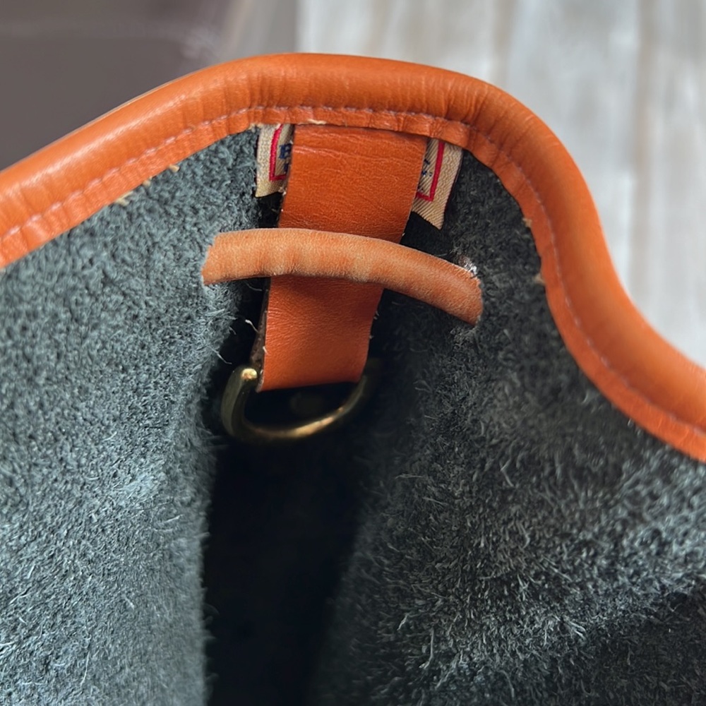 Vintage Dooney and Bourke Pebbled Leather Bucket Bag with brass accents - Picture 15 of 16